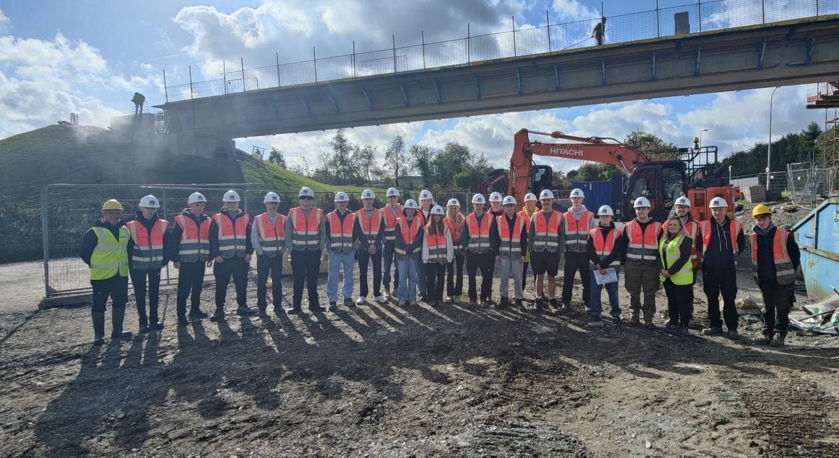 Construction and civil engineering students on site at new bridge installation.